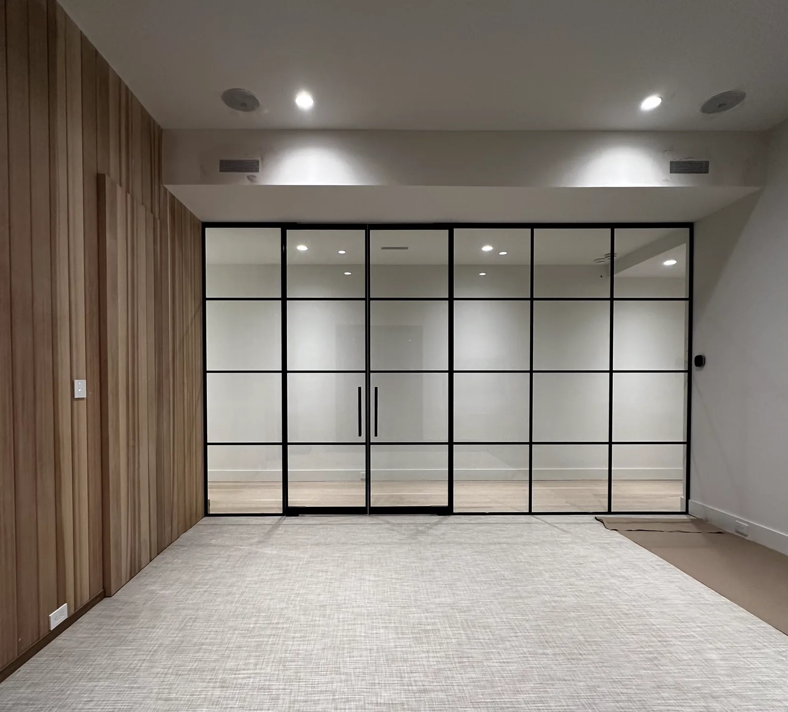 Double swinging French door glass partition by WiseGlass NY