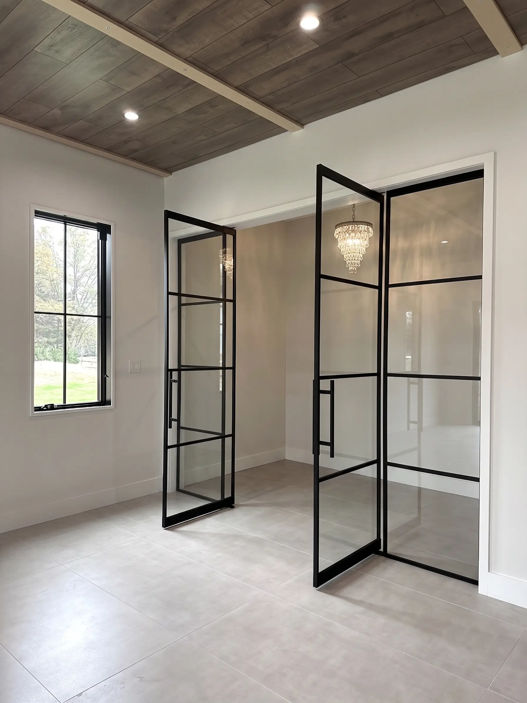 Custom double swinging glass doors open at 90 degrees by WiseGlass NY