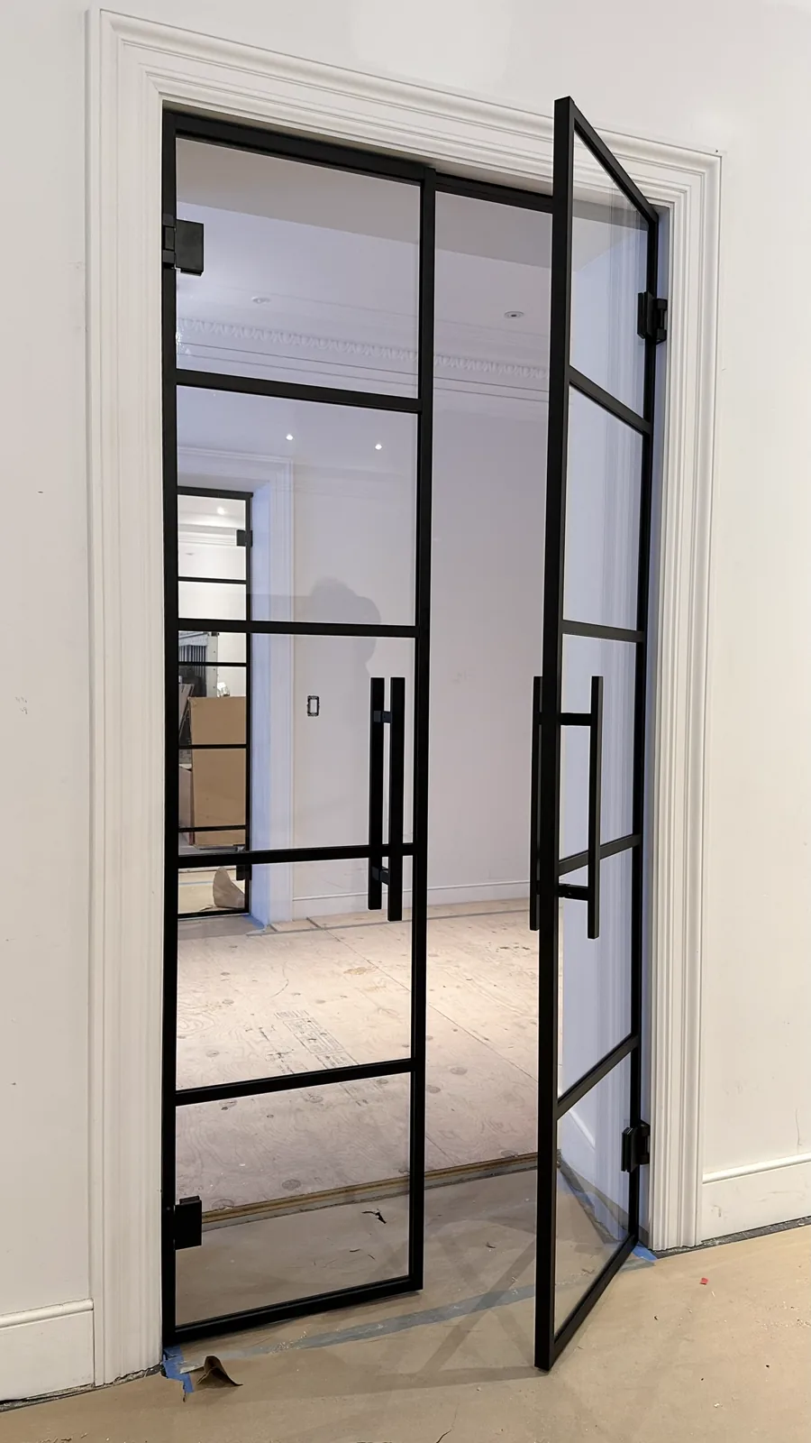 French glass doors with one leaf open, five-pane grid, by WiseGlass NY
