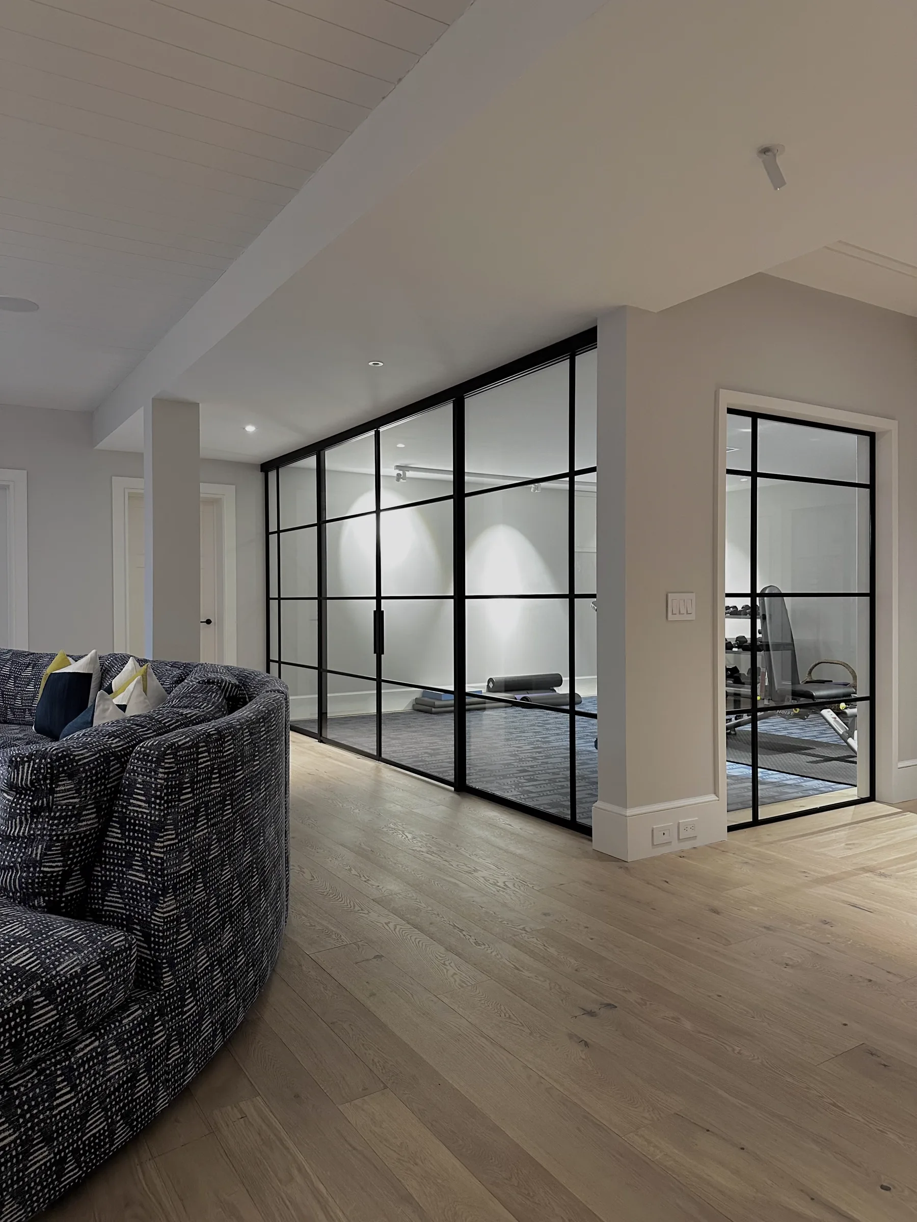 Custom double sliding glass partition by WiseGlass NY